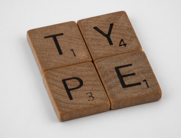 scrabble, scrabble pieces, lettering, letters, wood, scrabble tiles, white background, words, type, typography, design, layout,