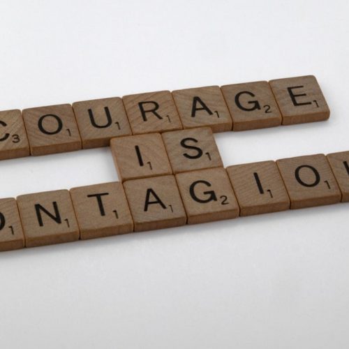 scrabble, scrabble pieces, lettering, letters, wood, scrabble tiles, white background, words, quote, letters, type, typography, design, layout, focus, bokeh, blur, photography, images, image, courage is contagious, courage, fear, leadership, lead, be brave, bravery, challenge, face challenges, do not fear,