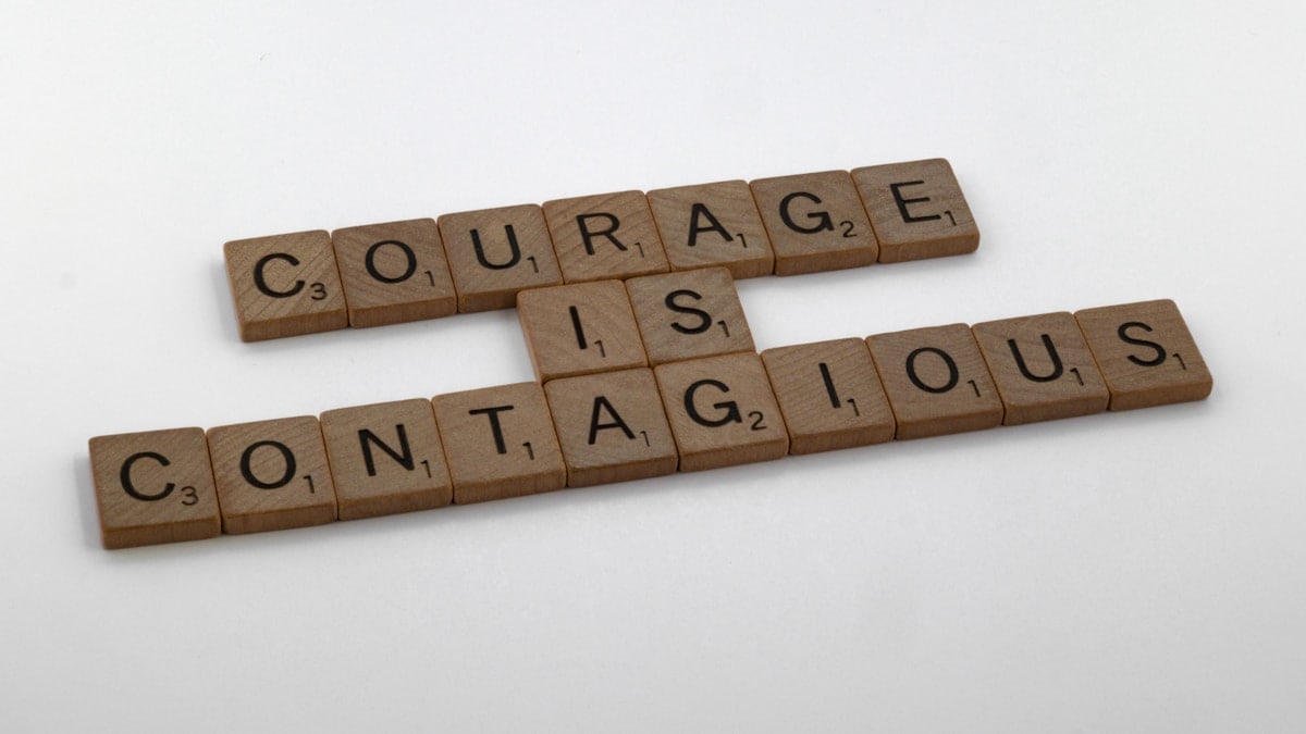 scrabble, scrabble pieces, lettering, letters, wood, scrabble tiles, white background, words, quote, letters, type, typography, design, layout, focus, bokeh, blur, photography, images, image, courage is contagious, courage, fear, leadership, lead, be brave, bravery, challenge, face challenges, do not fear,